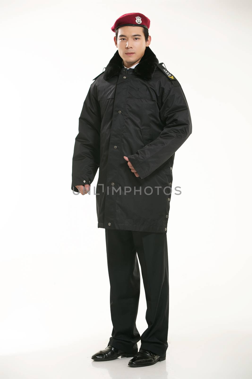 Create all kinds of work clothes policeman stands in front of a white background by quweichang