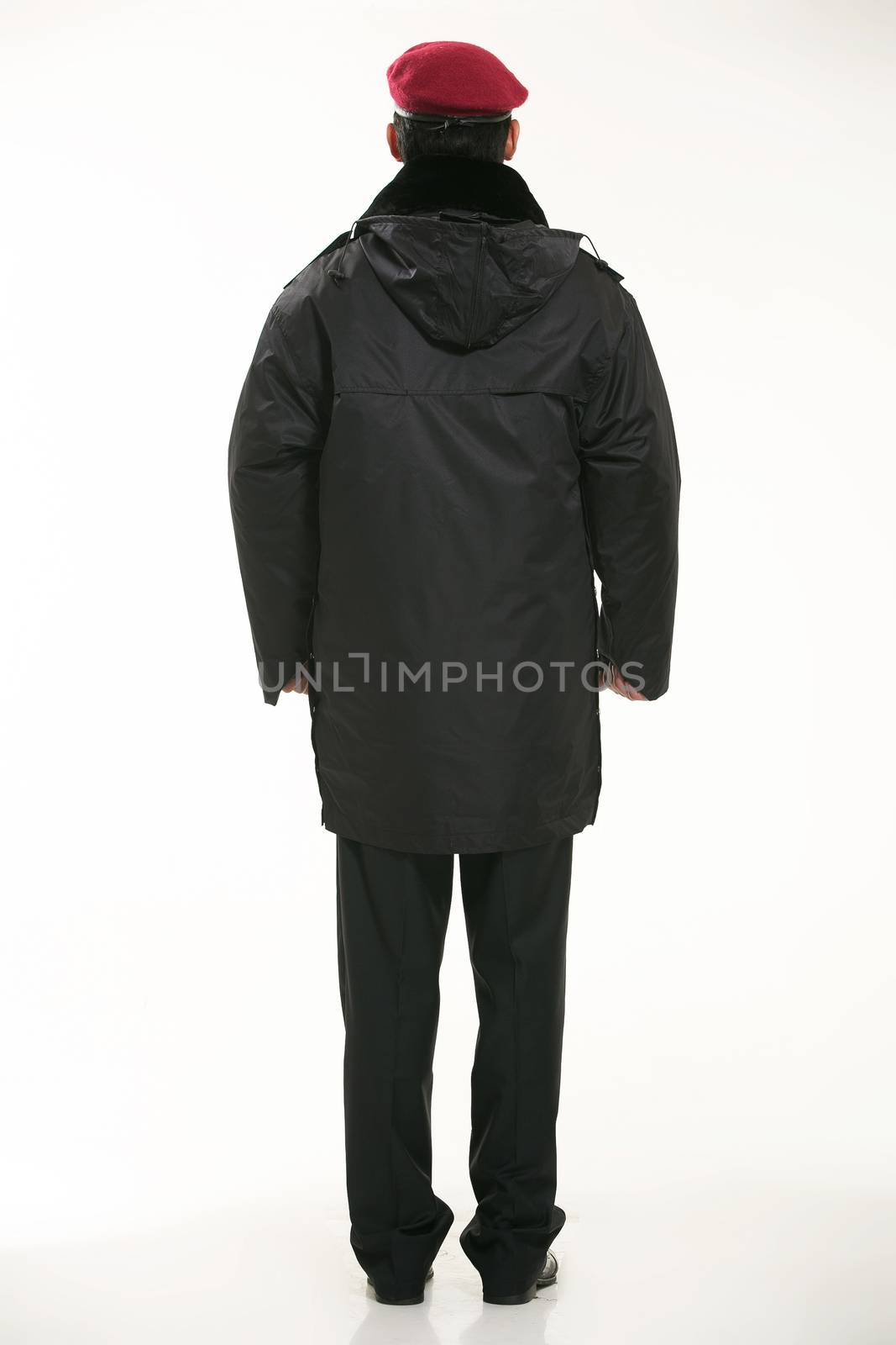 Create all kinds of work clothes policeman stands in front of a white background by quweichang