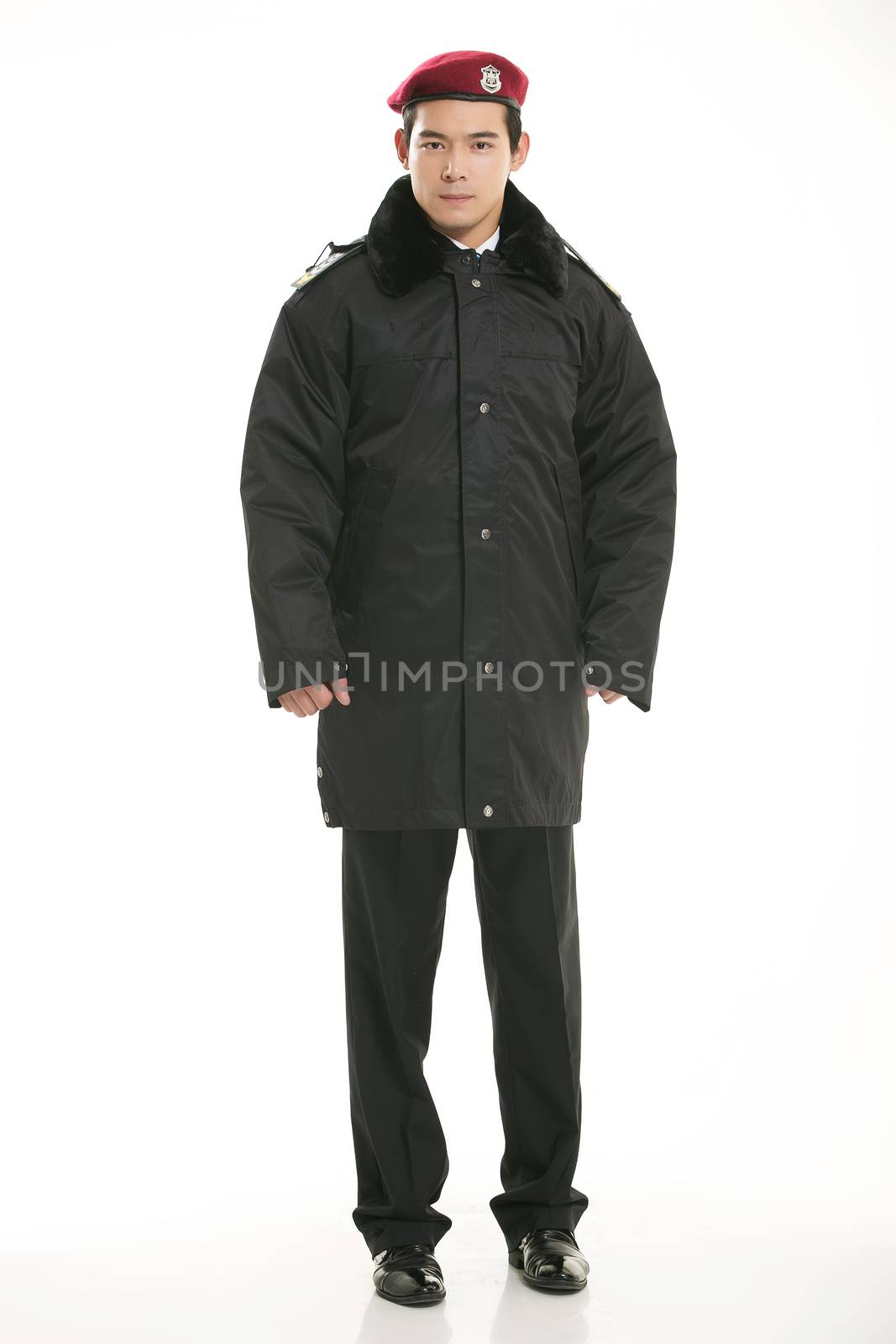 Create all kinds of work clothes policeman stands in front of a white background by quweichang