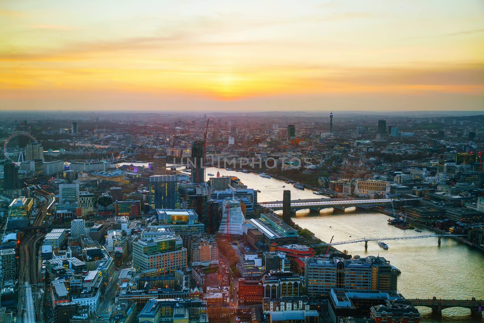 Aerial overview of London city at sunset