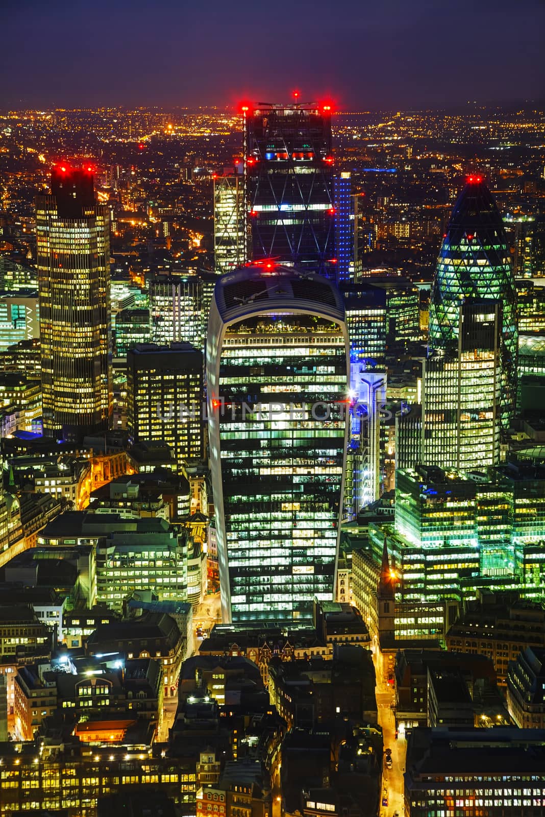 Aerial overview of the City of London financial ddistrict at night
