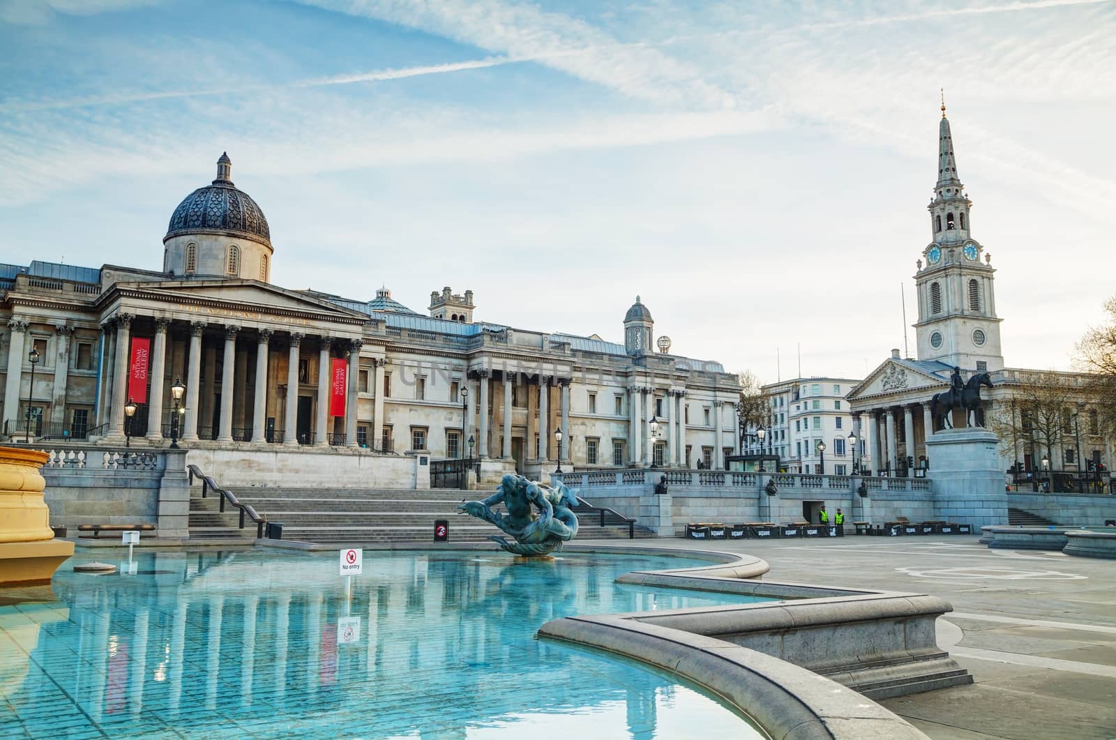 LONDON - APRIL 12: National Gallery building at Trafalgar square on April 12, 2015 in London, UK. Founded in 1824, it houses a collection of over 2,300 paintings dating from the mid-13th century to 1900.