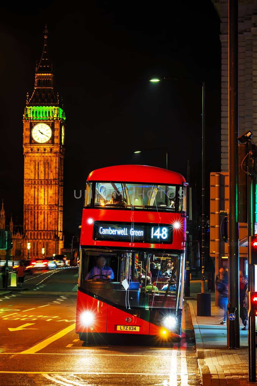 LONDON - APRIL 14: Iconic red double decker bus on April 14, 2015 in London, UK. The London Bus is one of London's principal icons, the archetypal red rear-entrance Routemaster recognised worldwide.