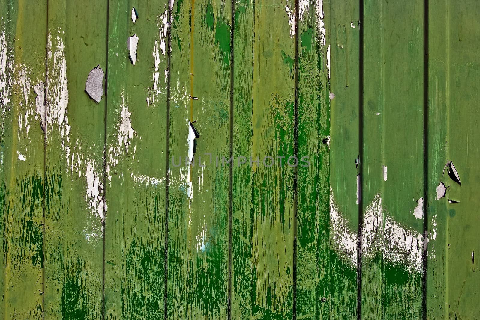 Dirty, stained by a paint the hammered together fence by H2Oshka