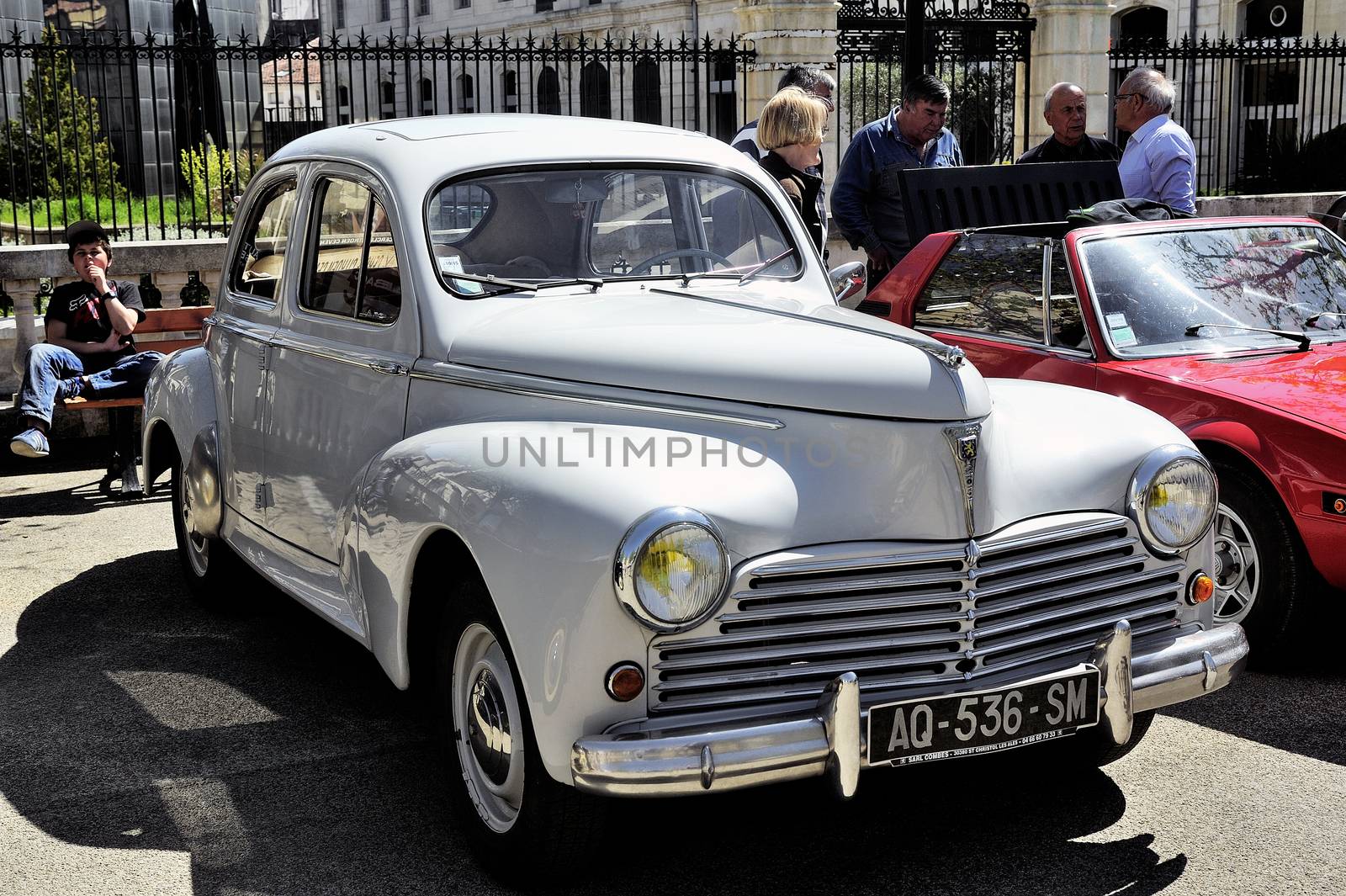 Peugeot 203 manufactured from 1948 to 1960 photographed the rally of vintage cars Town Hall Square in the town of Ales, in the Gard department