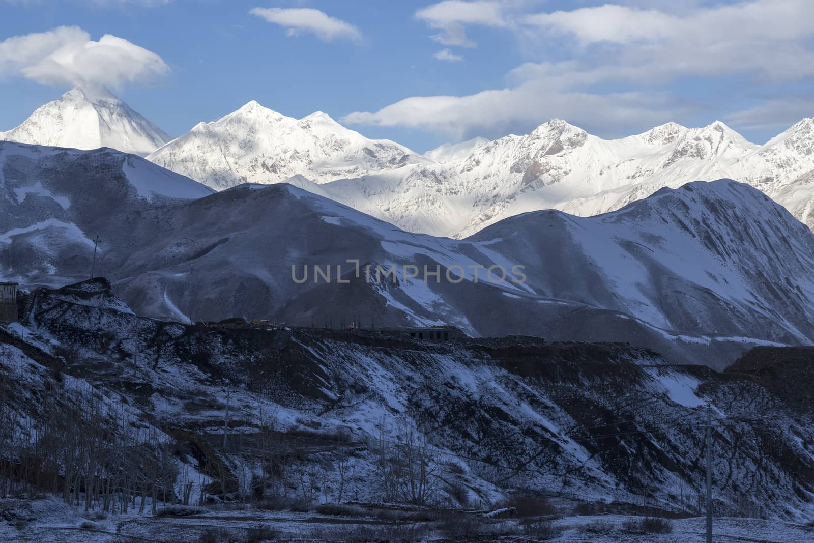 Muktinath village in the morning before sunrise. All area cover by snow.
This is one of the path of Annapurna Circuit trail, Nepal.