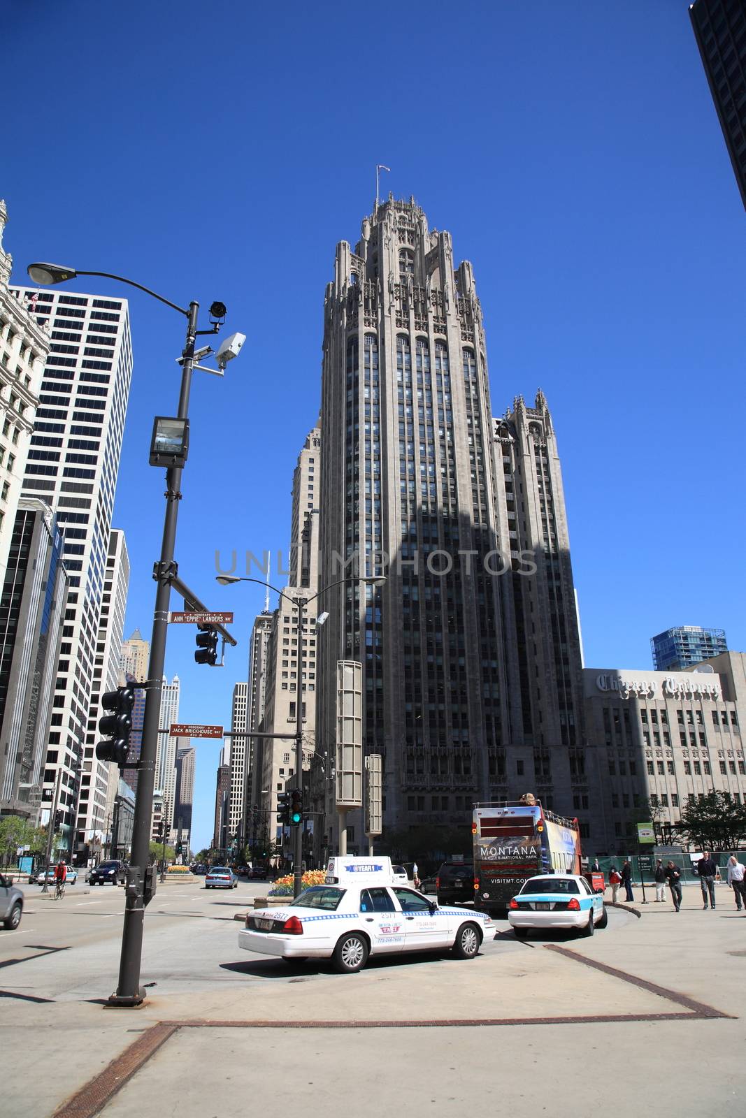 Michigan Avenue in Chicago, with the Tribune Building and pedestrians.