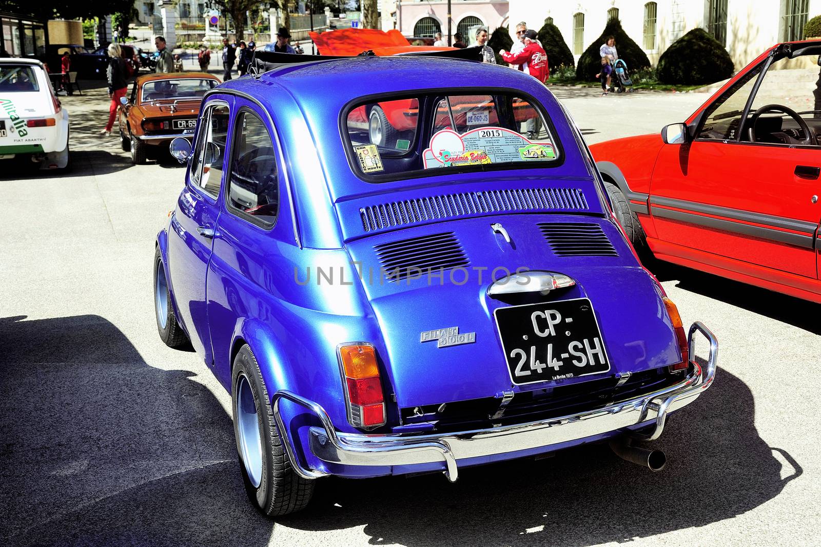 Old Fiat 500 Abarth racing equipped photographed vintage car rally Town Hall Square in the town of Ales