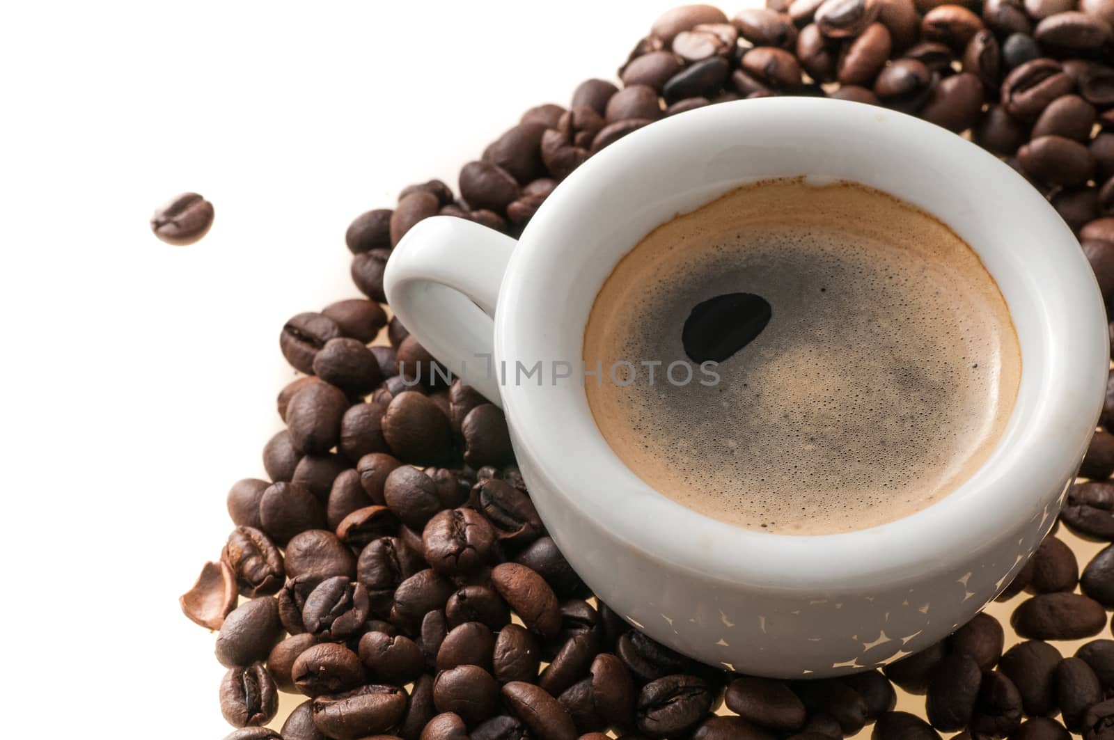 cup of coffee with beans