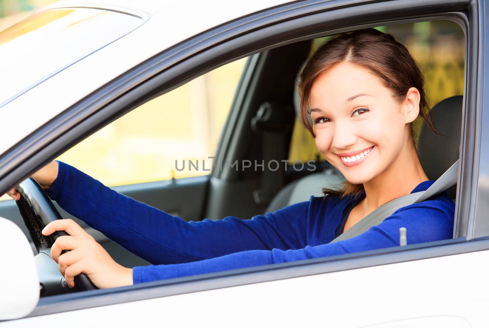 Pretty girl in a car