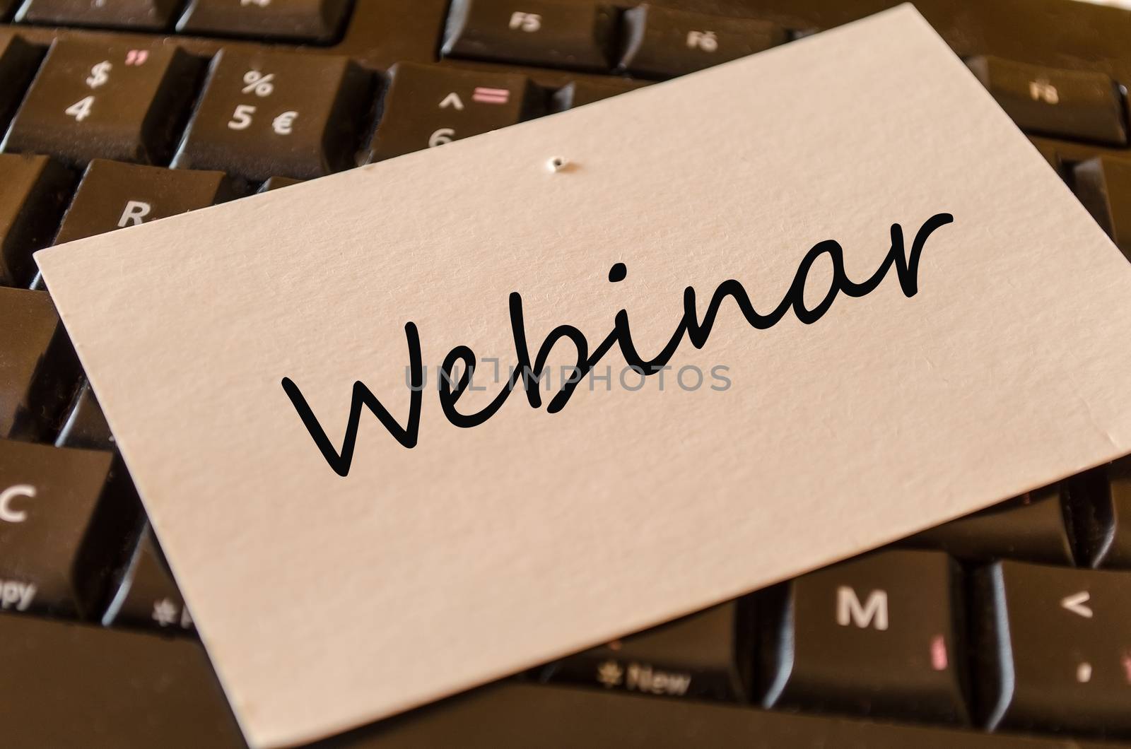 Webinar Concept on black keyboard