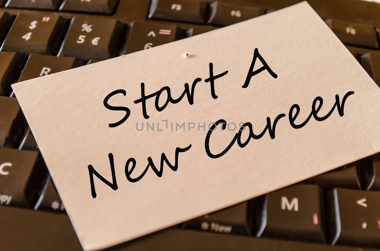 Start a new career Concept on black keyboard note