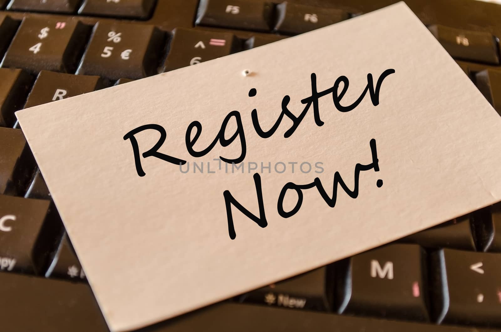 Register Now Concept on black keyboard