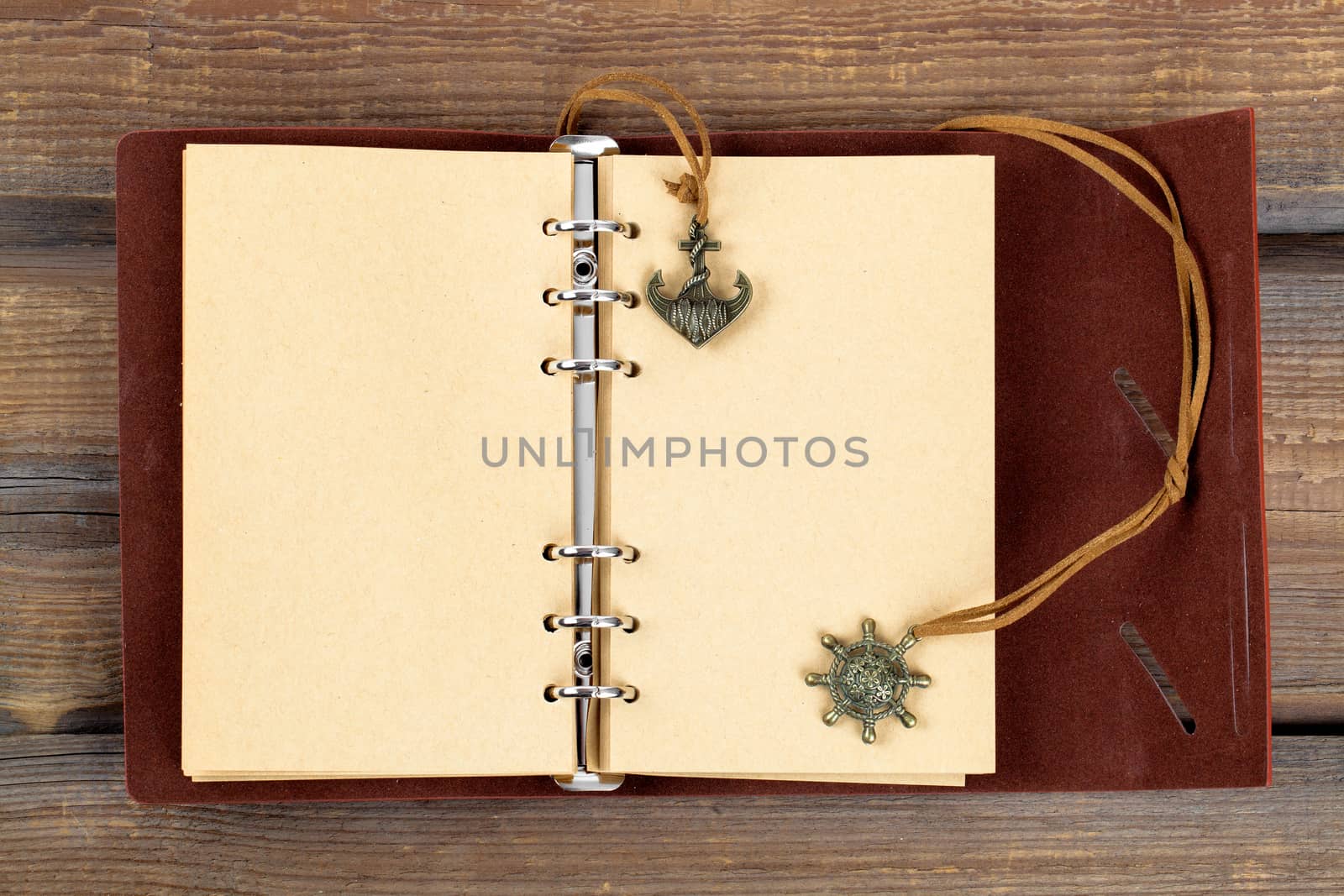 Vintage book, open, on old wooden table, with clipping path by motorolka
