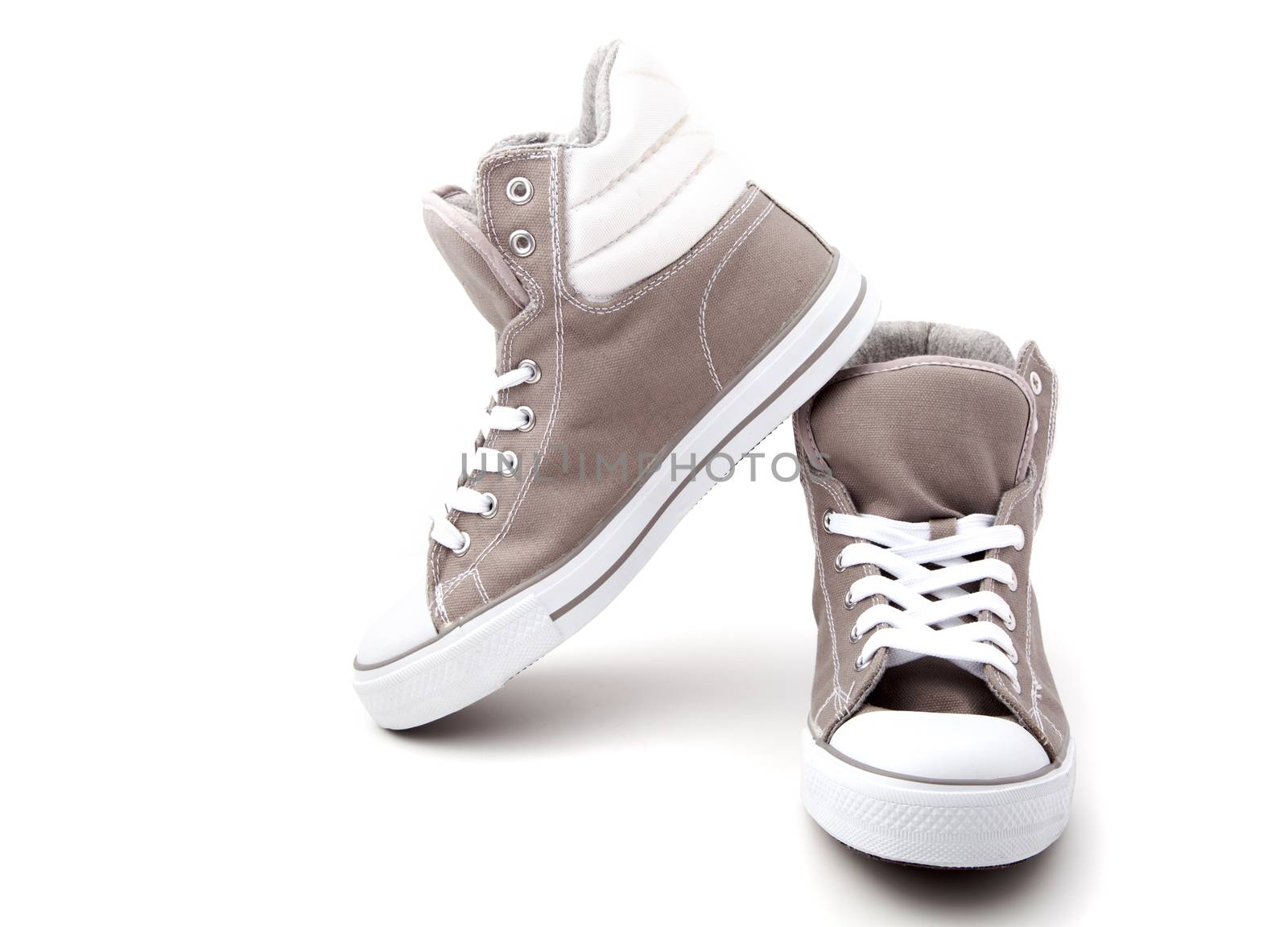 sneakers isolated on white background by motorolka
