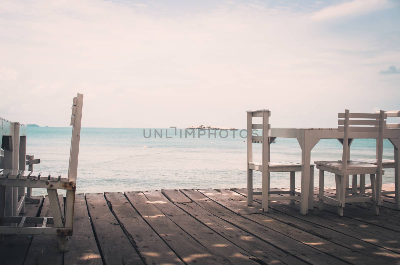 Wood dock White chair and table in Koh Samet Thailand vintage