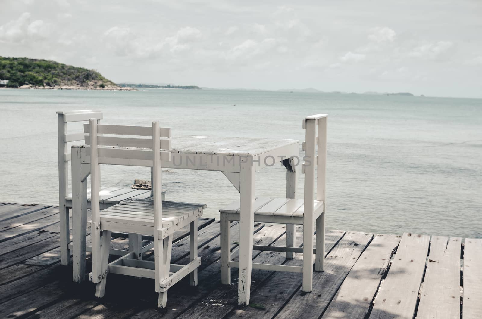 Wood dock White chair and table in Koh Samet Thailand vintage