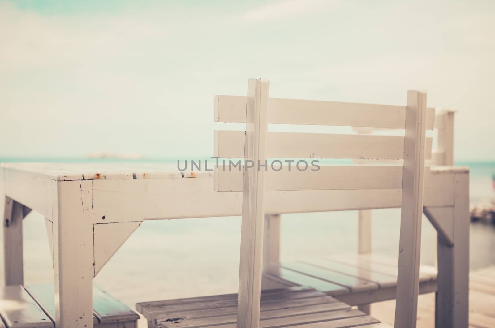 Wood dock White chair and table in Koh Samet Thailand vintage