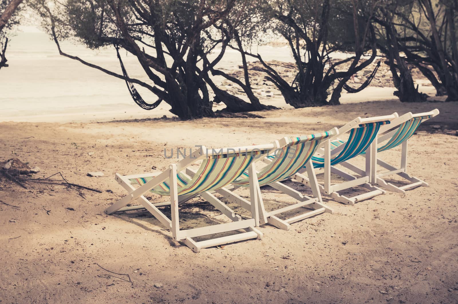 Beach colorful chair on the beach in Koh Samet Thailand vintage