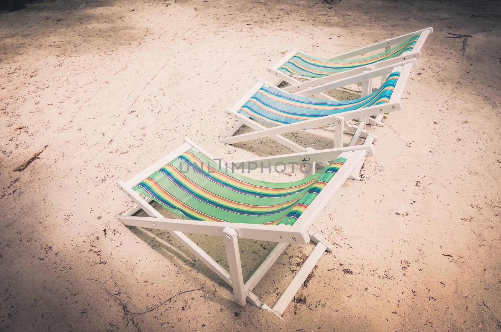 Beach colorful chair on the beach in Koh Samet Thailand vintage