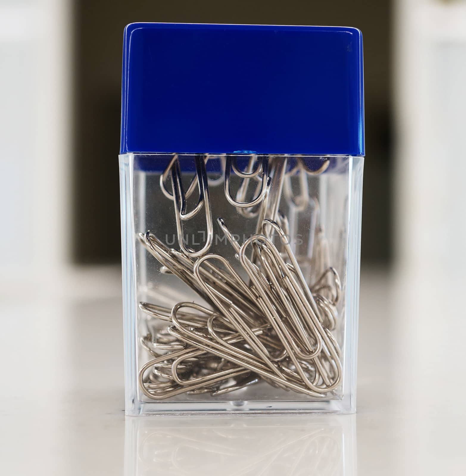 Paper clips on plastic box by ninun