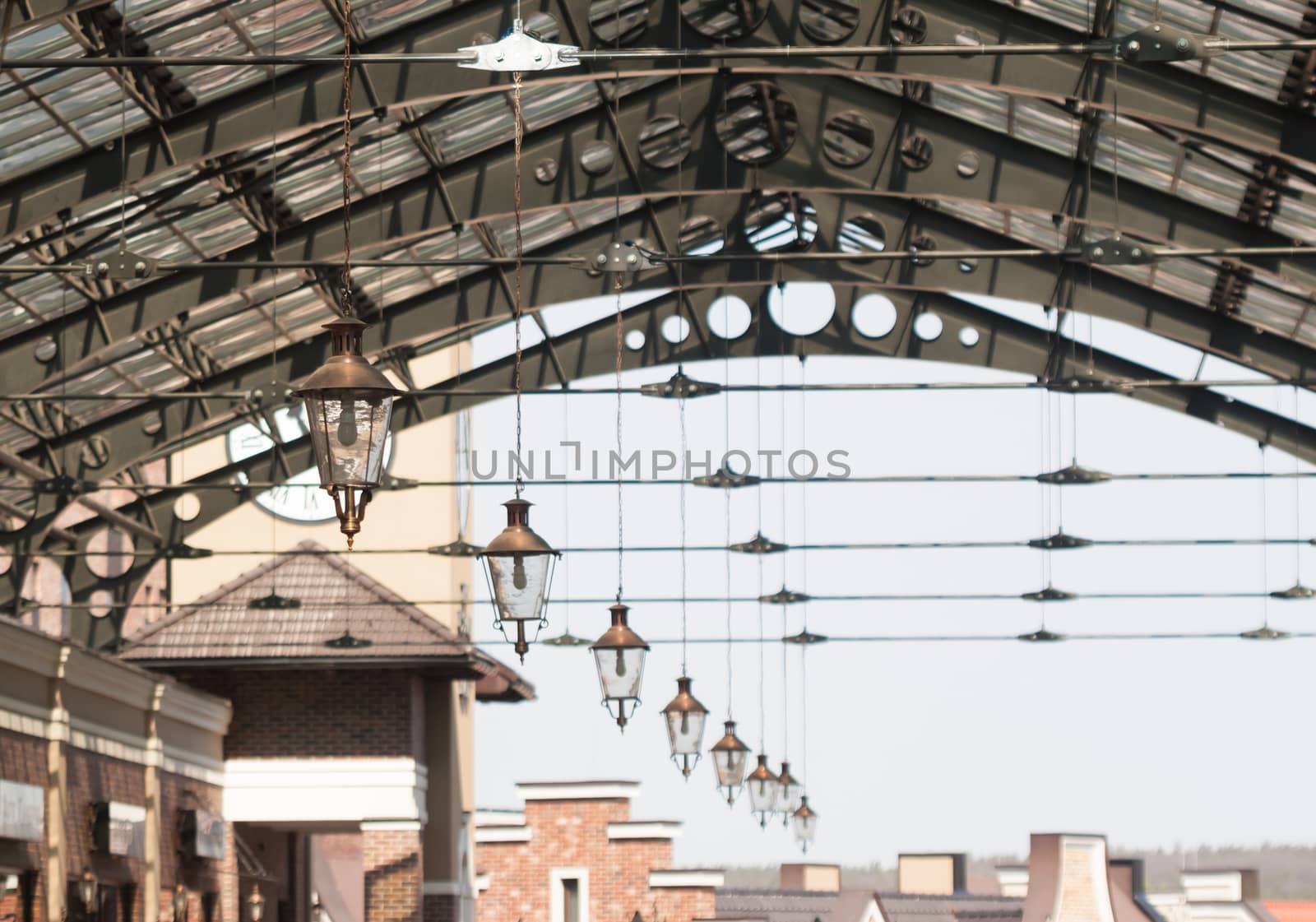 roof of railway station with old-fashioned lanterns