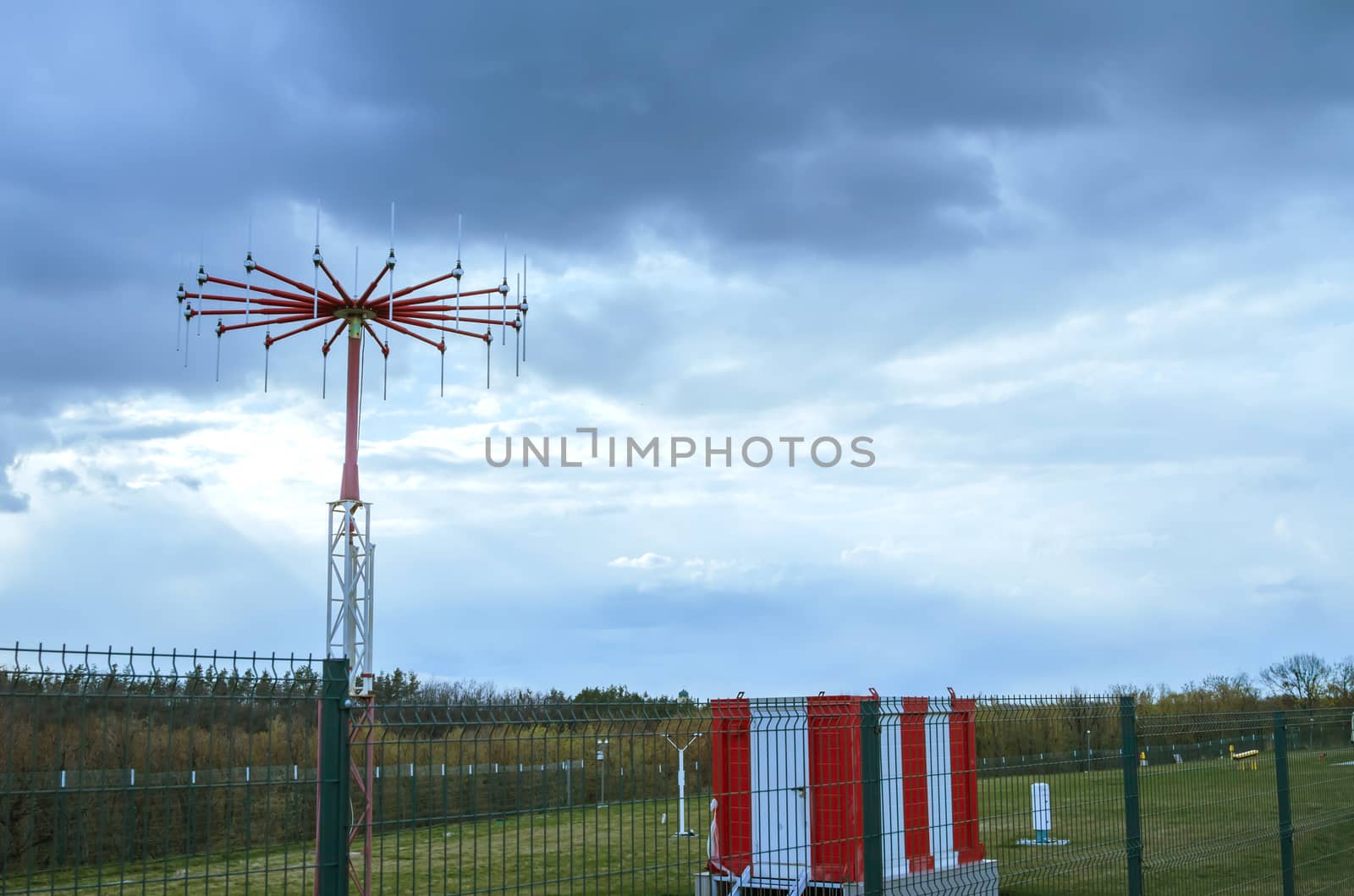 antenna in private airport on cloudy sky background