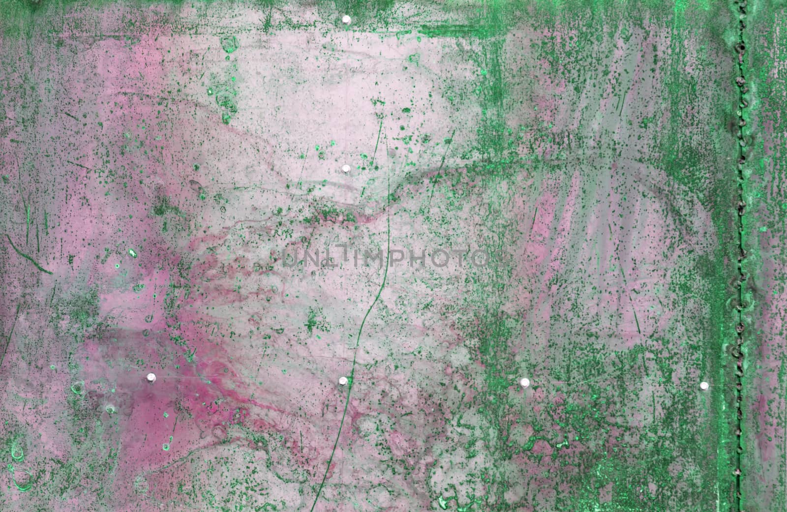 scratched and rusty green metal surface as background