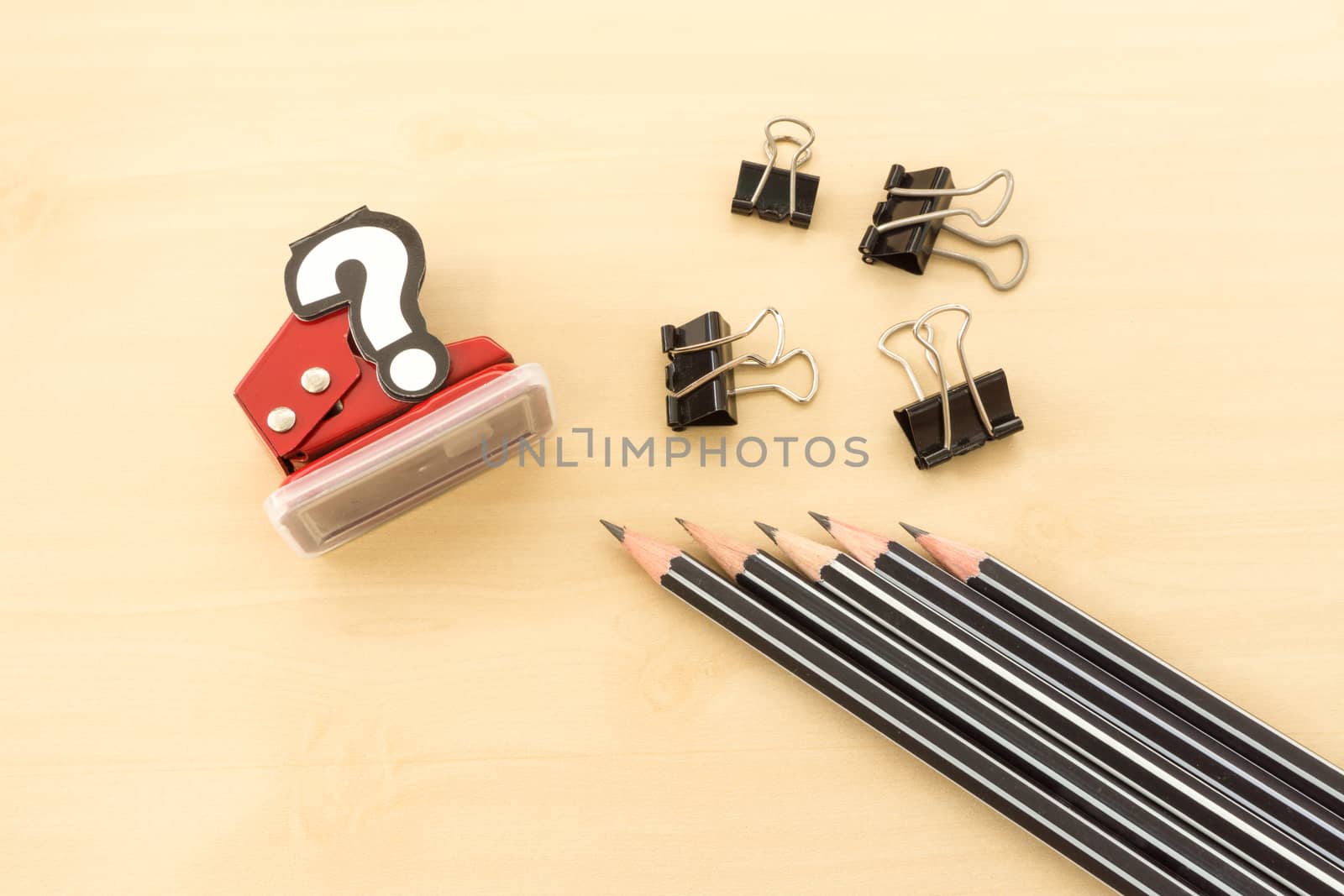 Office Tools Contain Pencil, Paperclip and Hole Punch