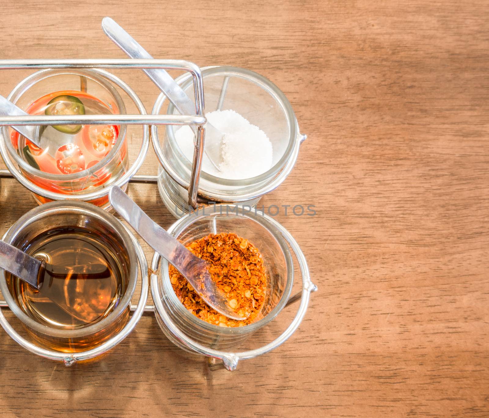 Thai Condiment for Noodle with Four Glasses of Ingredient