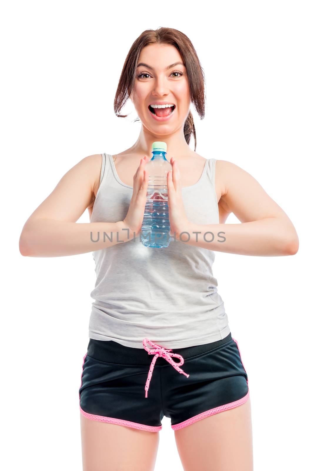 portrait of a beautiful cheerful girl on a white background with a water bottle