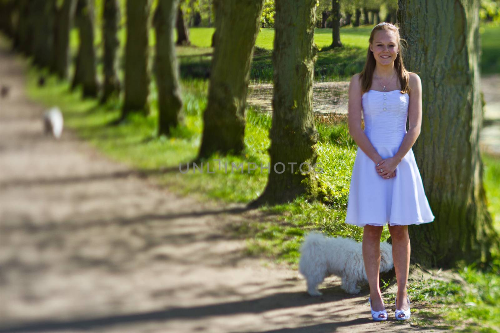 Girl the day of the confirmation in spring in denmark. Shot with a tilt and shift lense