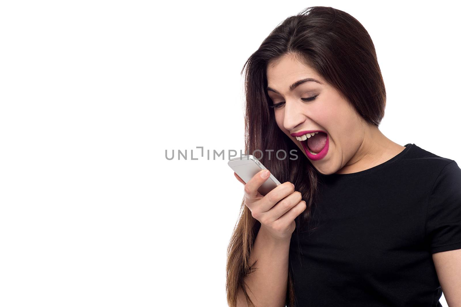Funny woman screaming on a cell phone