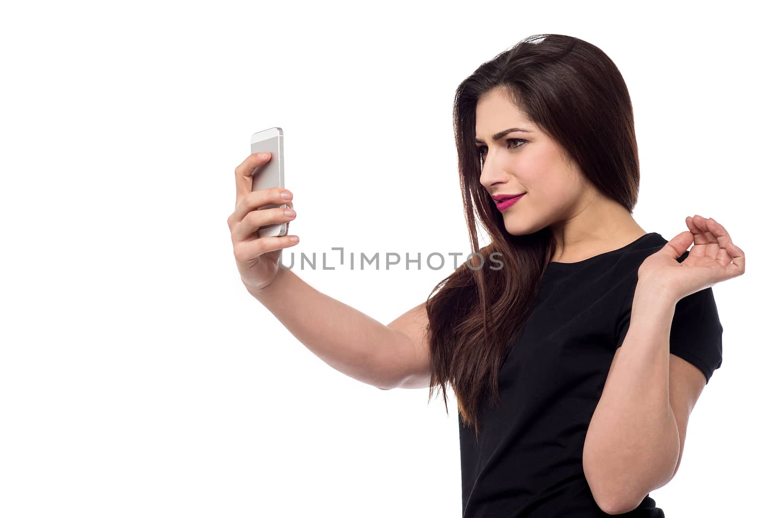 Beautiful woman taking a picture of herself