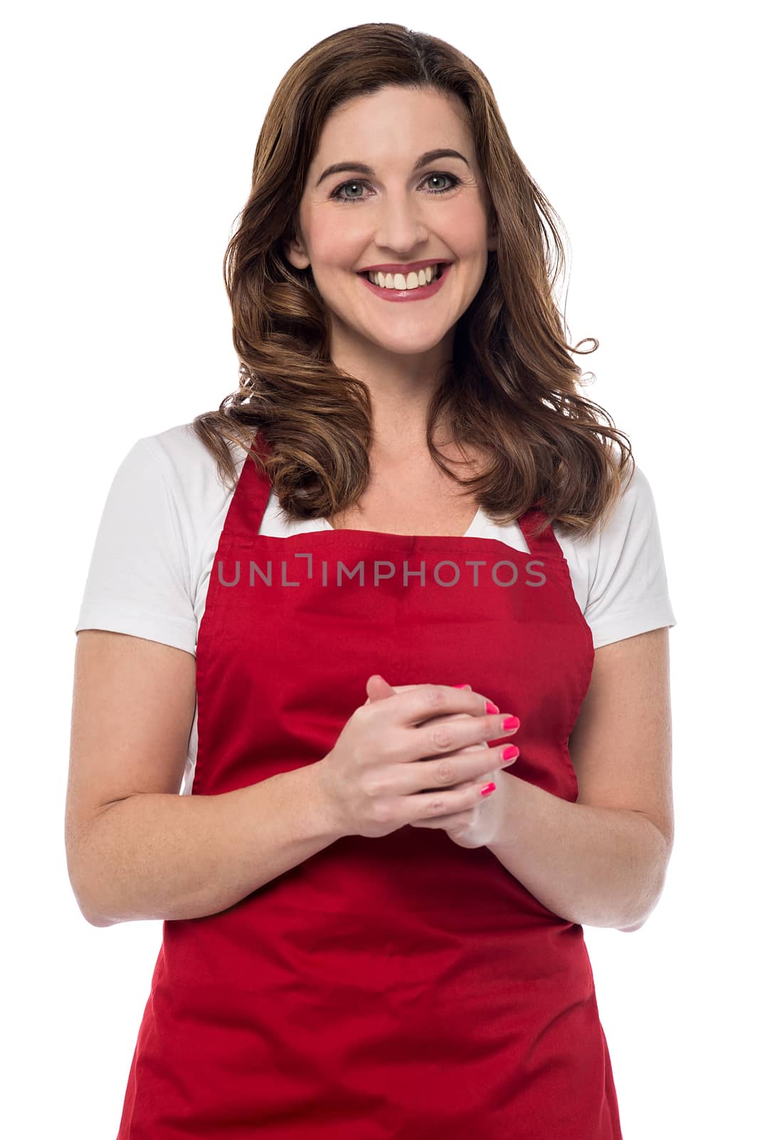 Female chef with her hands clasped