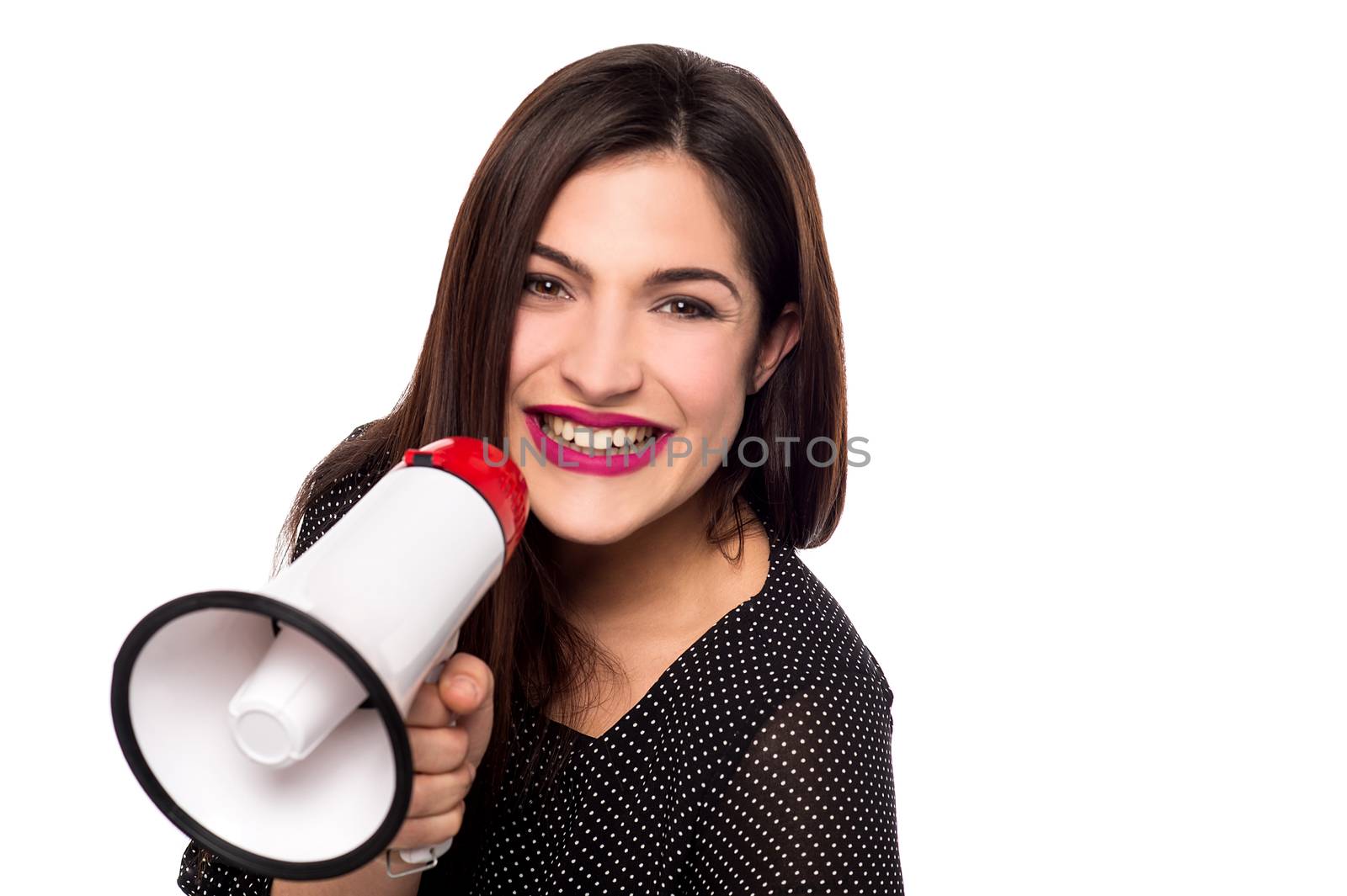 Pretty female proclaiming into the loudspeaker