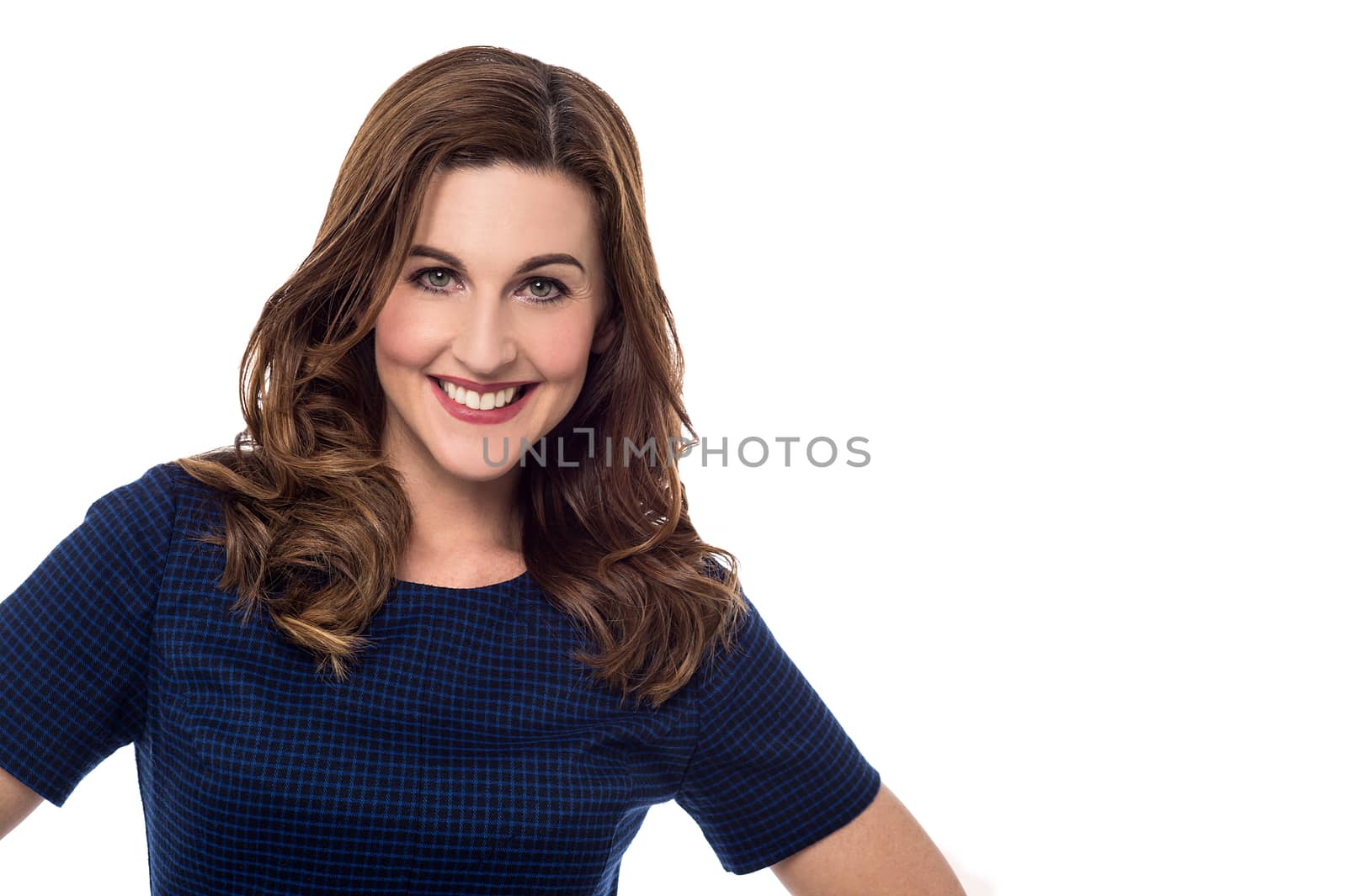 Middle aged woman posing casually by stockyimages