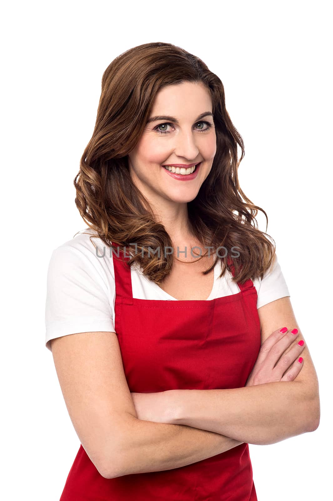 Confident female chef over white by stockyimages