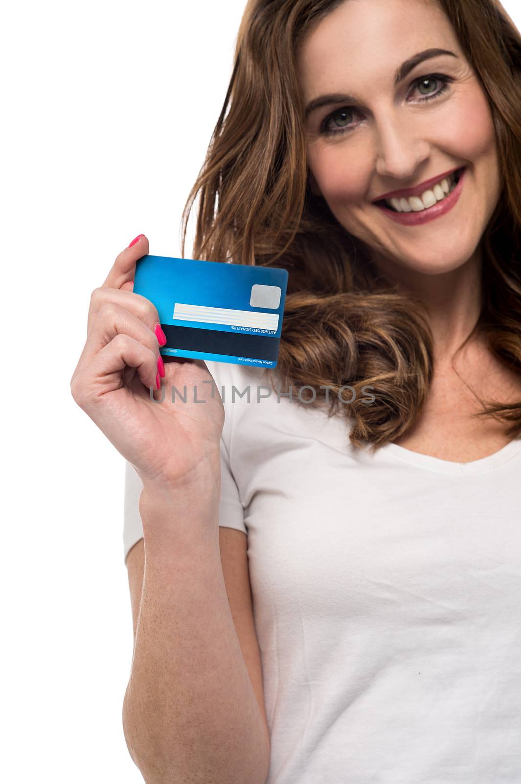 Happy woman showing her cash card to camera