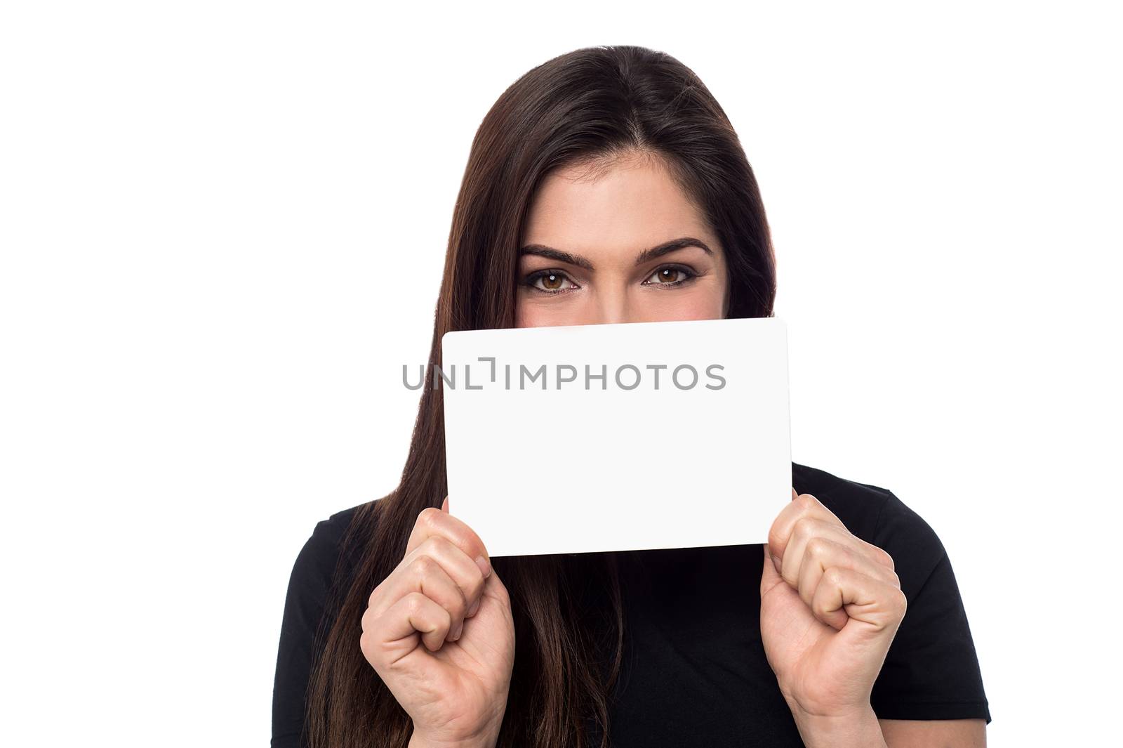 Young woman showing blank banner to camera