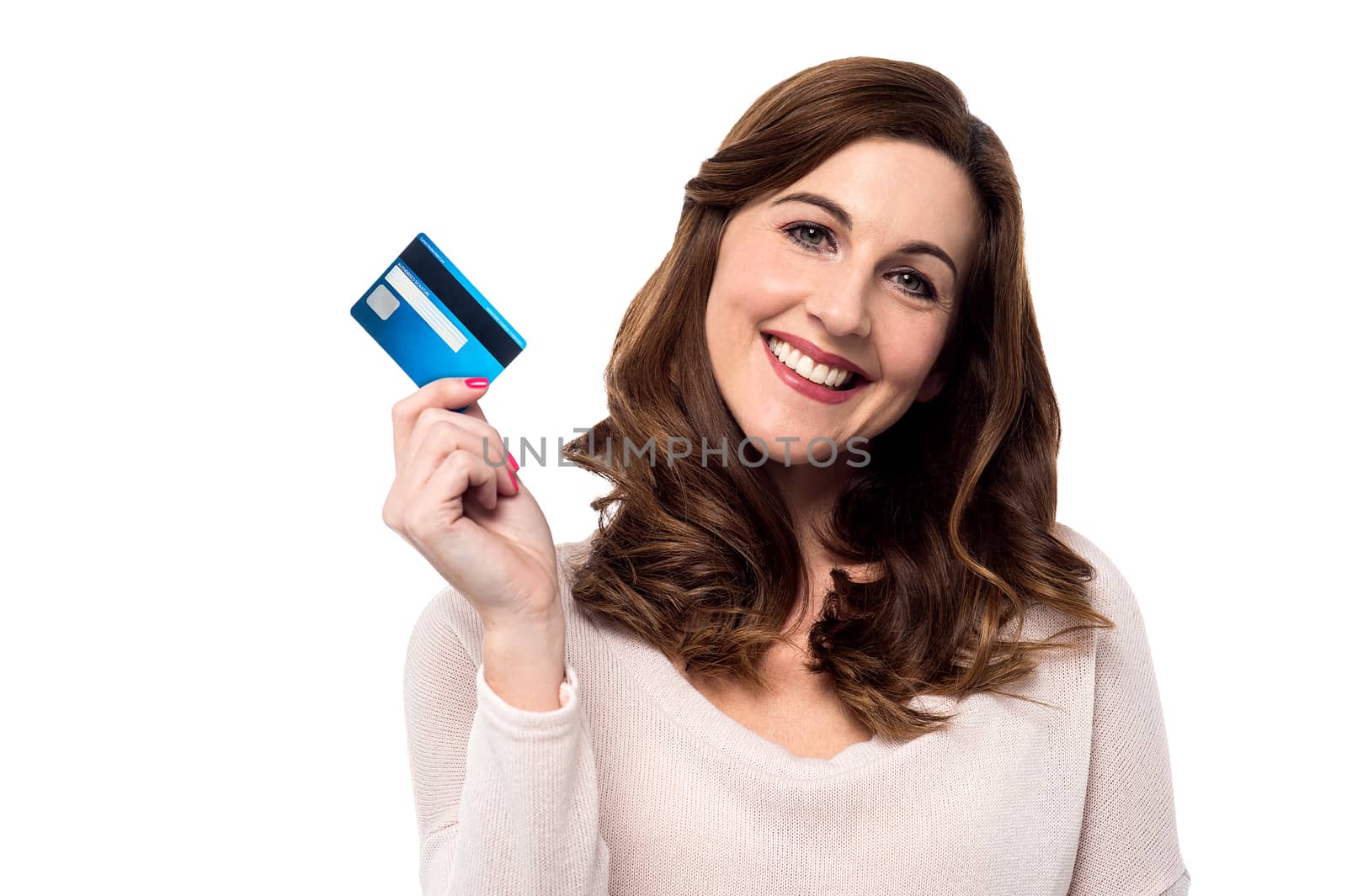 Happy smiling woman showing her credit card
