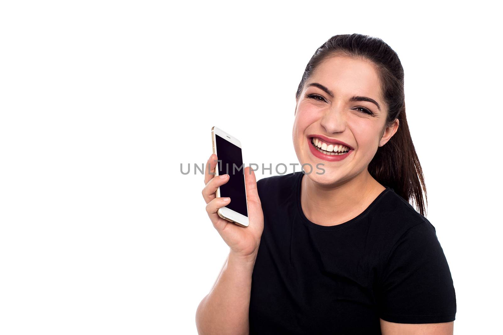Cheerful woman laughing hard with cell phone
