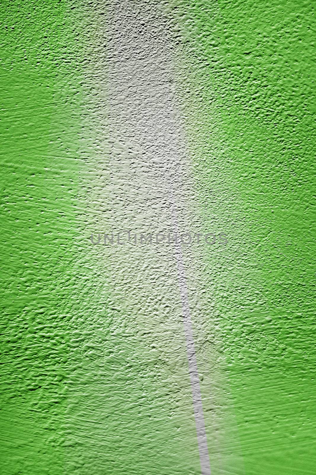 Green wall stucco background with gray line