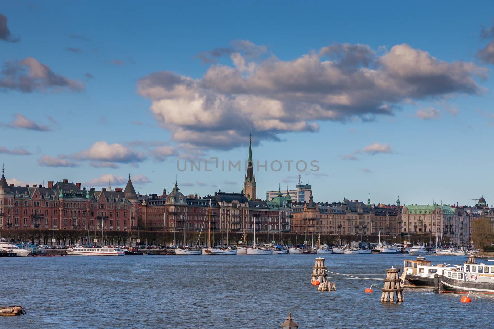 Scenic summer panorama of the Old Town -Gamla Stan architecture pier in Stockholm, Sweden