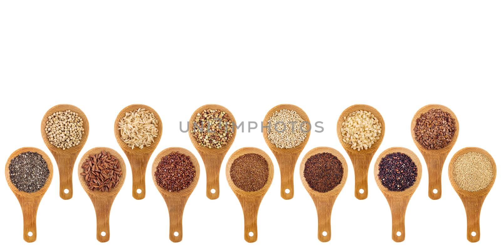 a variety of gluten free grains (buckwheat, amaranth, brown rice, millet, sorghum, teff, black, red, white and black quinoa, chia seeds, flax seeds) on wooden spoons isolated on white