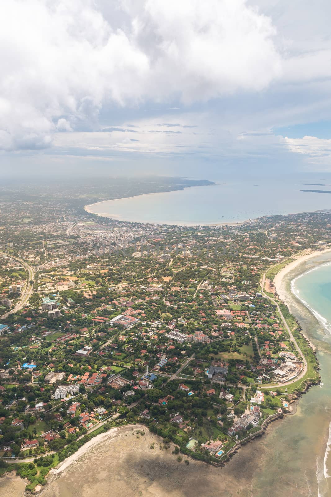 Aerial view of the city of Dar Es Salaam along the shores of the Indian Ocean showing the densely packed buildings