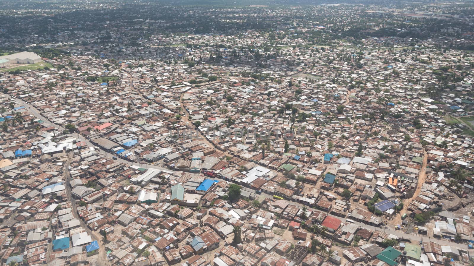 Aerial view of the city of Dar Es Salaam  showing the densely packed houses and  buildings