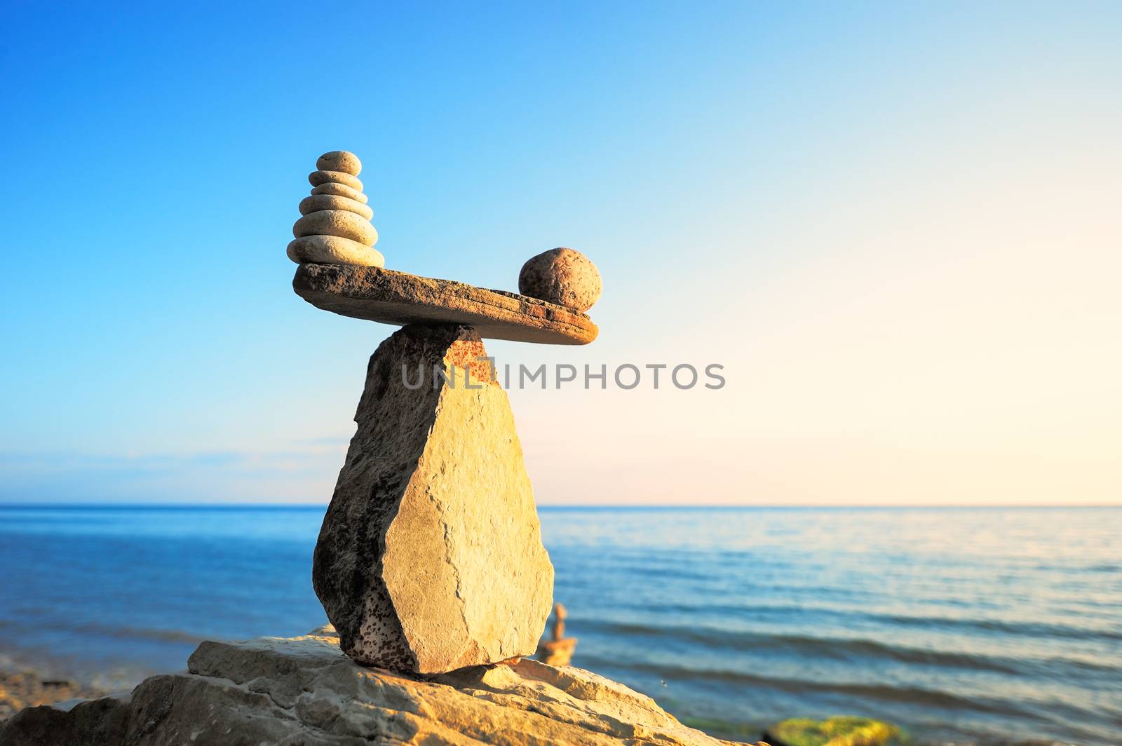 Well-balanced of pebbles on the top of stone