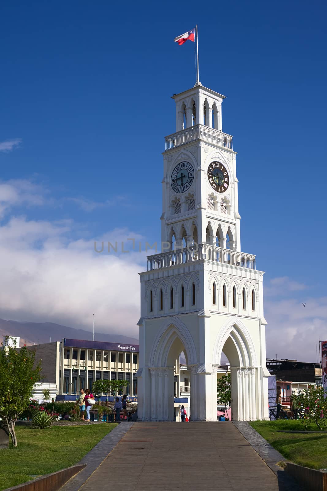 IQUIQUE, CHILE - JANUARY 22, 2015: The Torre Reloj (clock tower) from the year 1877 on Plaza Prat main square on January 22, 2015 in Iquique, Chile. Iquique is a free port city in Northern Chile. 