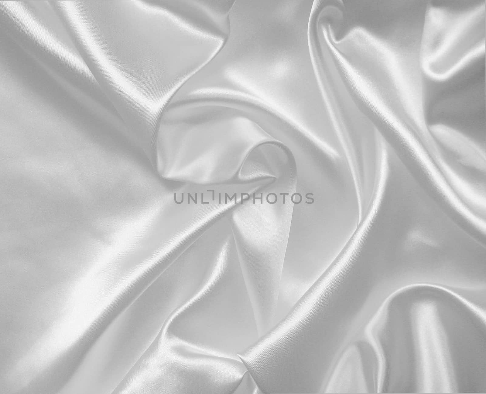 Smooth elegant white silk or satin texture can use as wedding background